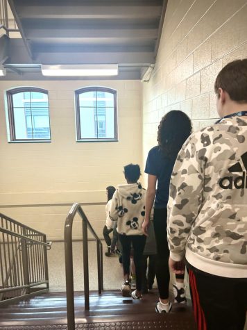 On the move. Seventh grade ELA teacher Lindsay Zerbee walks her class to lunch. Zerbee and her students complete this task daily.