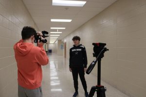 Were rolling! Bradley Musselman and Rylan Horell are filming down the halls. They are working on their camera angles to make sure that the new JPP segment is well done! We need to get some more shots over here, said Musselman.