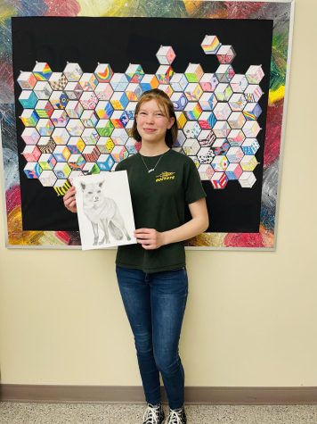 Hailey Goheen is showing off her sketch of a fox! This is one of Goheens favorite drawings.