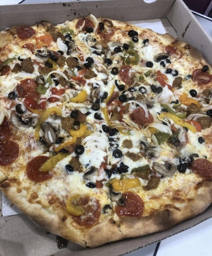 This is what their works round pizza looks like.  They only sell this pizza as a round pizza.
