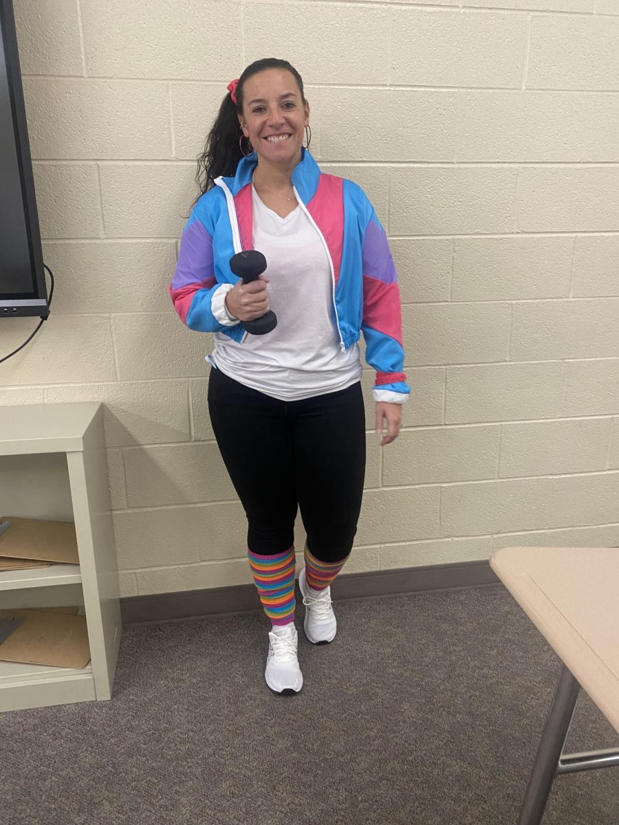 Sixth grade health teacher Courtney Beegle shows she is drug free by dressing up like its the 80s again! Beegle smiled and held up her weight as she is proud to be drug free!