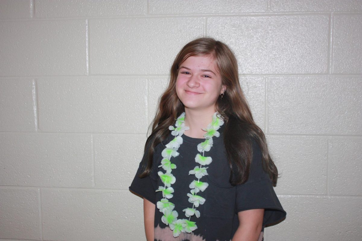 Eighth grader McKenna Koeck wears her Hawaiian outfit to lei off drugs! She was so proud to be drug free!