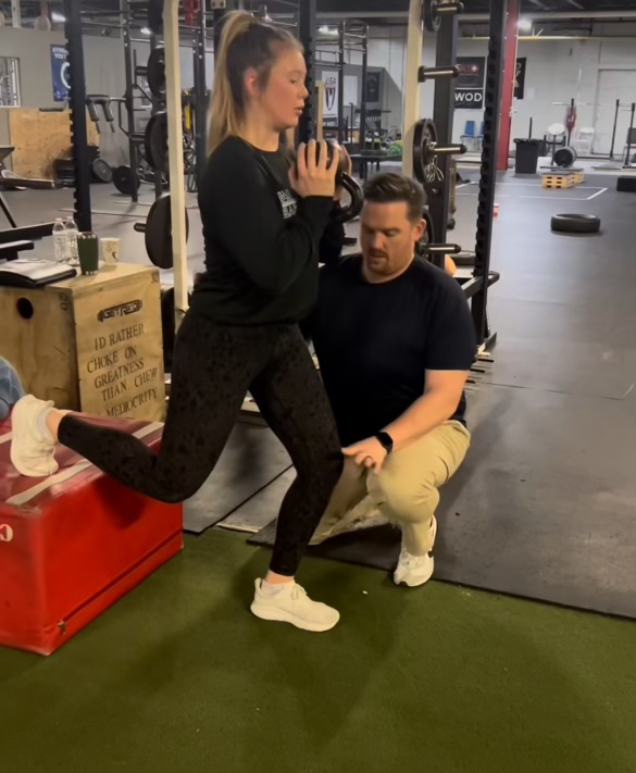 Haulmans Therapy. Zach Haulman is helping Ayla Hieman with her injury from basketball. Haulman selects the best exercises and treatments to help everyone with their own individual injuries. “I especially like working with athletes because of their motivation to get better and back on the field,” Haulman said. 