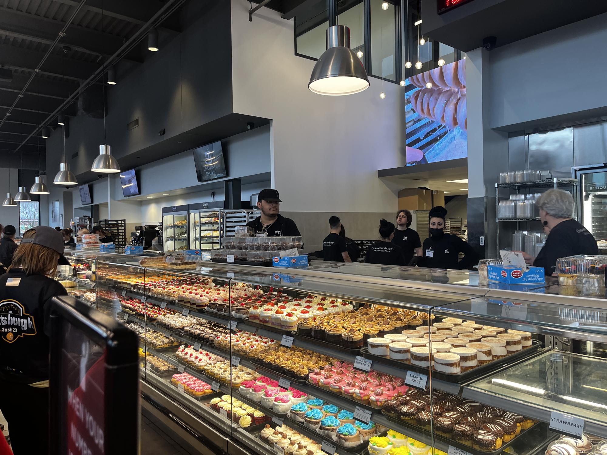 Employees take customers by number and help pick out your baked goods. They usually have no down time due to how busy and popular the bakery is. 