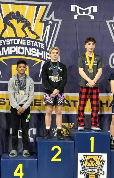 Pin to win! Eighth grader Deklan Barr places second overall in his weight and age category. Barr wrestled at 115 pounds in the 14-year-old division. 