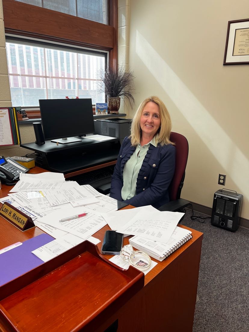 Sad smiles. Main principal Lori Mangan will no longer be located in the main office as of 2024. She has decided to retire after her long, hard-working time here. 