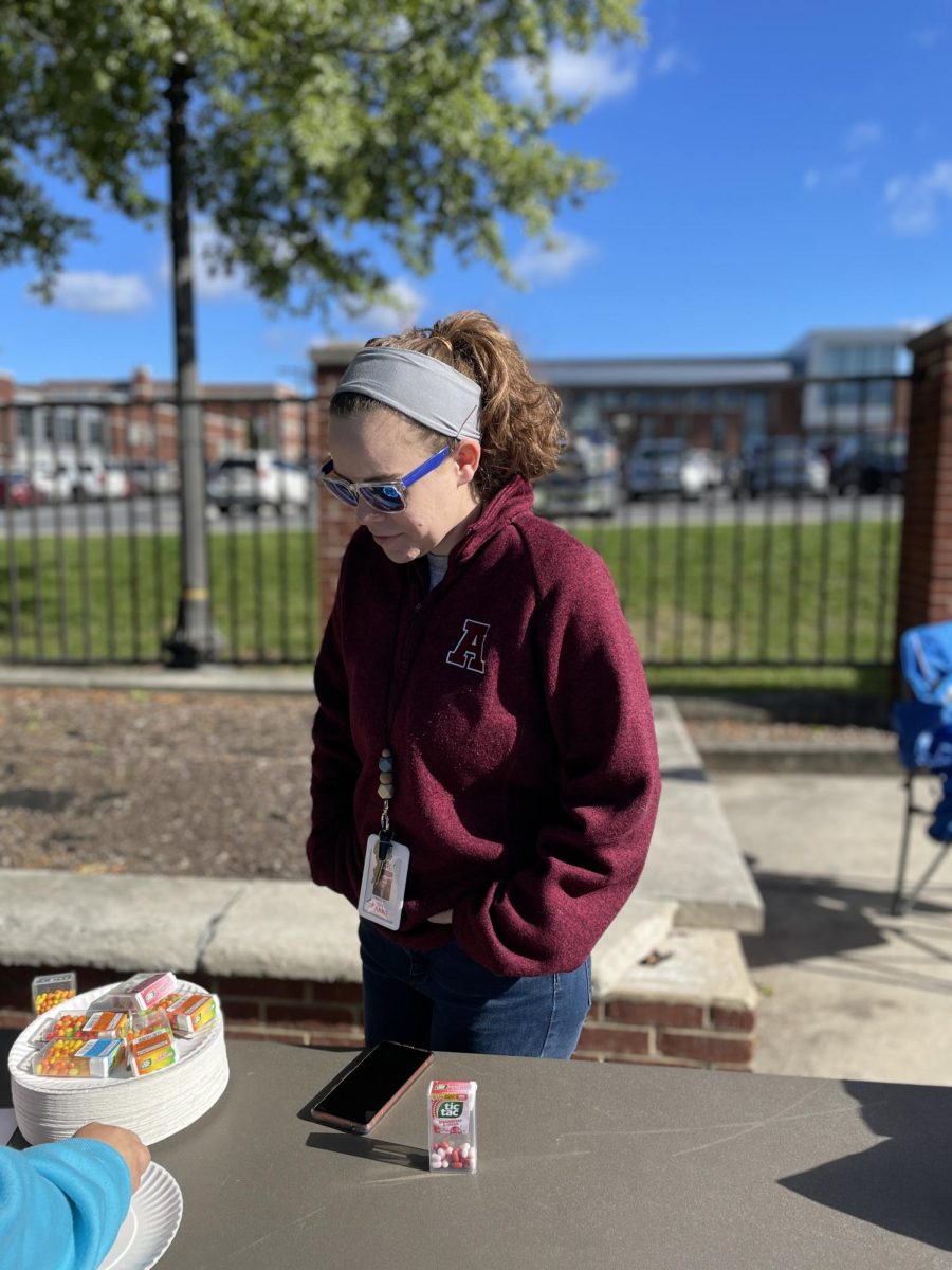 Seventh grade counselor Lindsey Smith is seen working at the Tic-tac challenge. The kids who participated in the challenge got free candy!