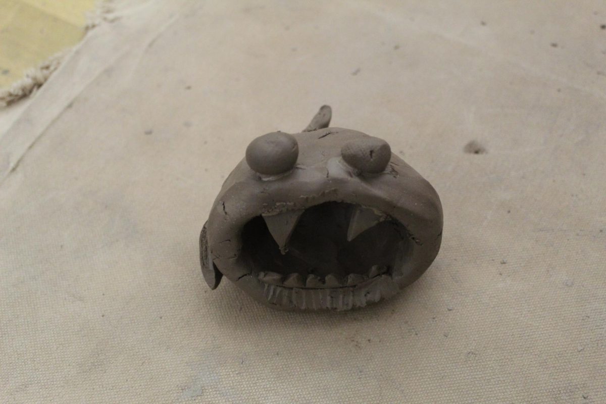 I'm going to eat you! Eight grader Jackson just finished making her shark pot.  She has 
 to wait for it to finish drying.