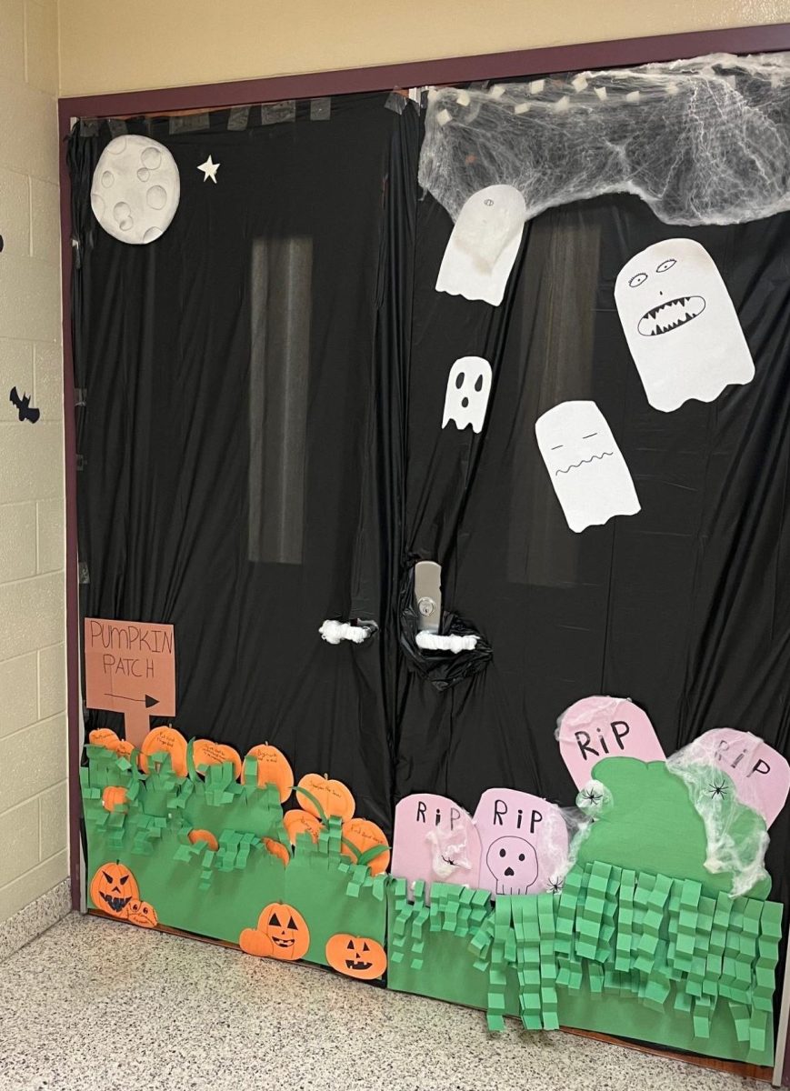 Friendly ghost! This is sixth, seventh and eighth grade music teacher Jess Connell's door. One of the creators eighth grader Hannah Doehrer says, "It was really fun coming up with ideas and having all the elements come together."
