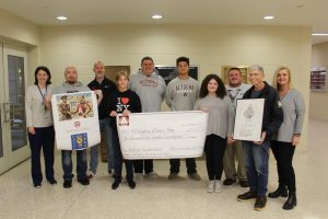 AAJHS staff presents Veterans day collection check to retired veteran Mr. Fink!
