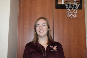 Go Lady Lions! This is seventh and eighth grade girl's basketball coach Erika Bailor, and she is smiling for a picture. She is so excited to share some information about this year's basketball season. " I can't wait to help the girls improve and learn new skills," said Bailor