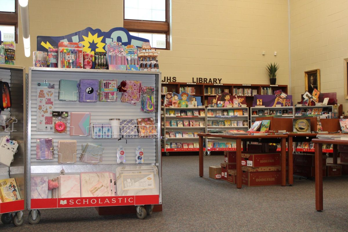 Book bonanza. The book fair has a huge selection of products each year. The book fair was stocked with erasers, books, posters and markers. Librarian Justina McCaulley said, “Posters are probably our best sellers.”
