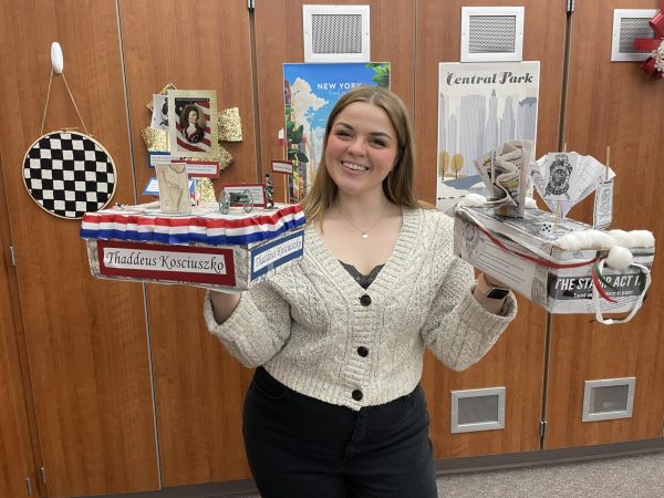 Eighth grade American cultures student teacher Olivia Snyder is the mastermind behind this project. She held two submissions from her students. It was her idea to make this project and cooperating teacher Elizabeth Bronson agreed that it was a good idea.