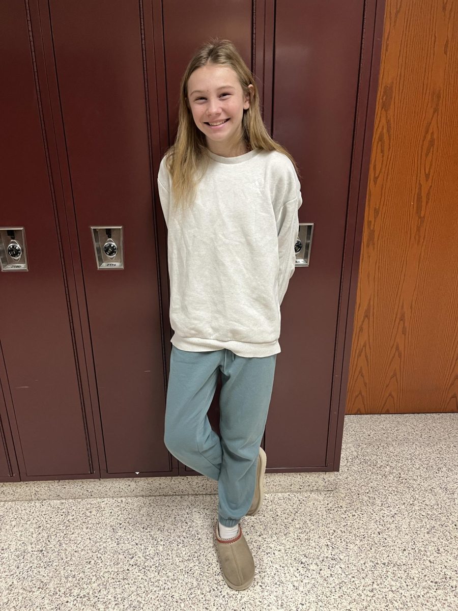 Eighth grader Emma Etters says, "Sledding. Because at my house, down the hill, we always crash into the creek and we slide on the ice."