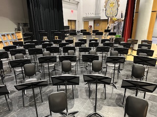 Stringed along. Shown here is an on stage shot of the equipment for the String Spectacular. Though the music was played on the same stage, different age groups varied in how they played. Eighth grade violin player Riley Miller said, "The higher the grade is, the more we play eighth notes and sixteenth notes, so it gets faster and faster."